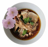 One Fine Shop.ca bakuté herbal soup pork dish with two light pink flower garnishes